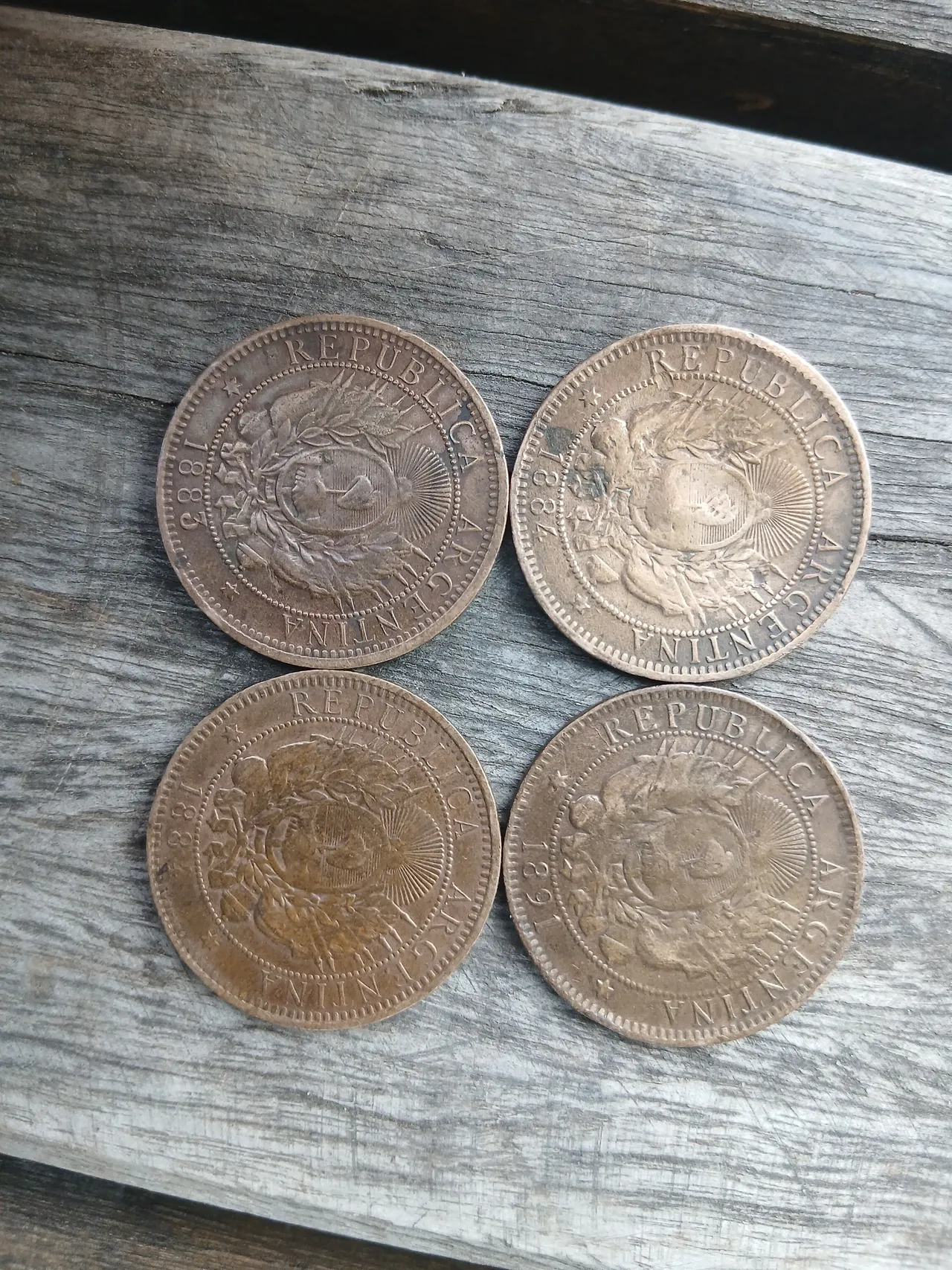 Lote 4 monedas antiguas 2 centavos Arg 1883 1884 1884 1891